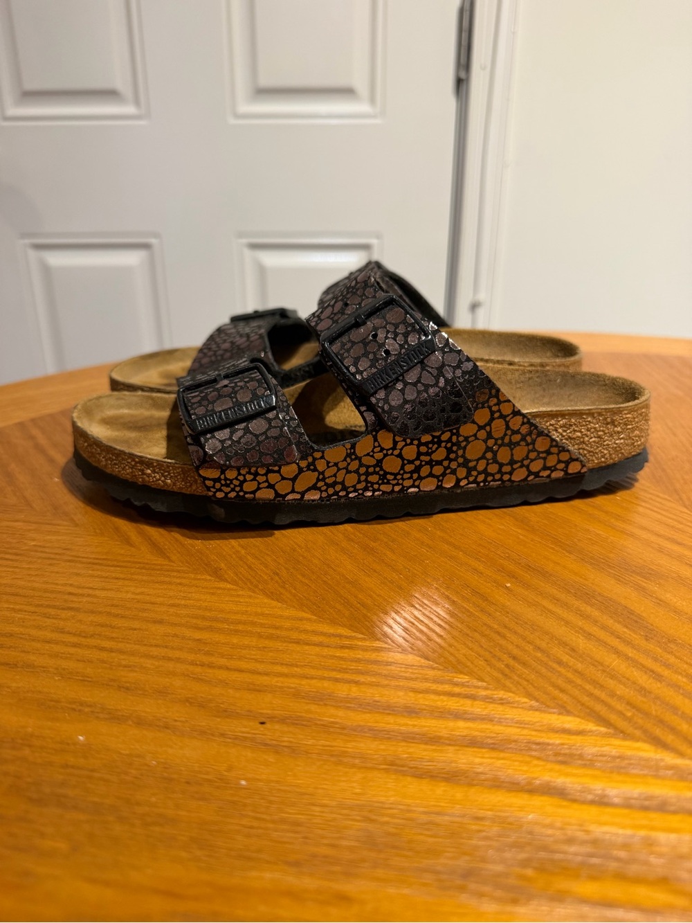 Birkenstock Brown and Black Two-Strap Slide Sandals